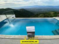 Burhaniye`de Emsalsiz 4+1 Yüzme Havuzlu Villa